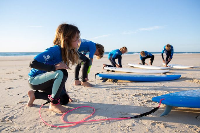 Surfing class on a beach